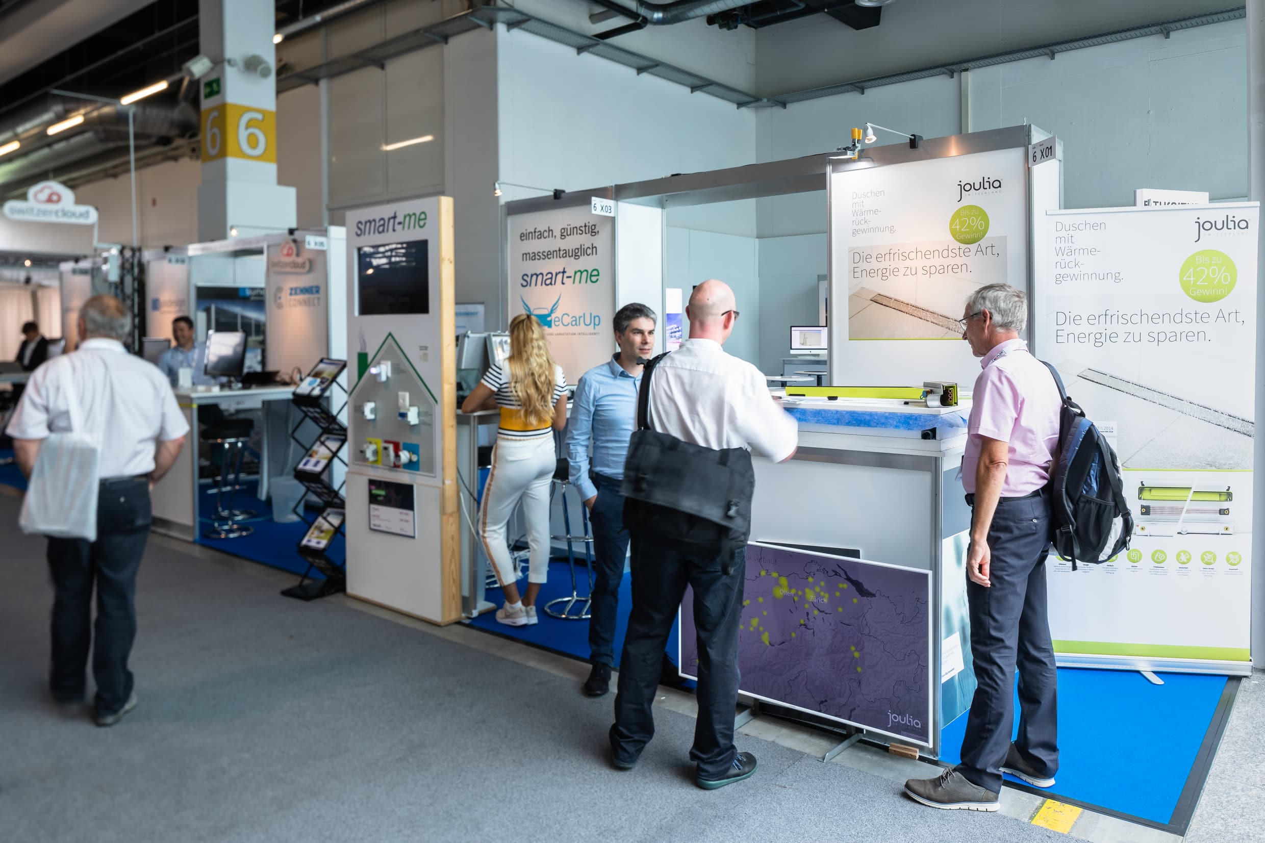 Visitors at a booth.